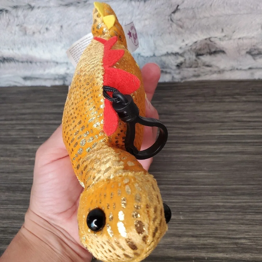 Scentsy Dinosaur Buddy Clips, Serra Stegosaurus, Scent: Tropical Tango